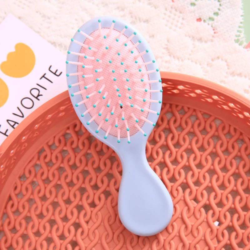 Mini Brosse à cheveux